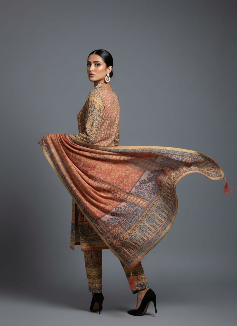 Woman wearing a traditional embroidered outfit with a shawl on a gray background