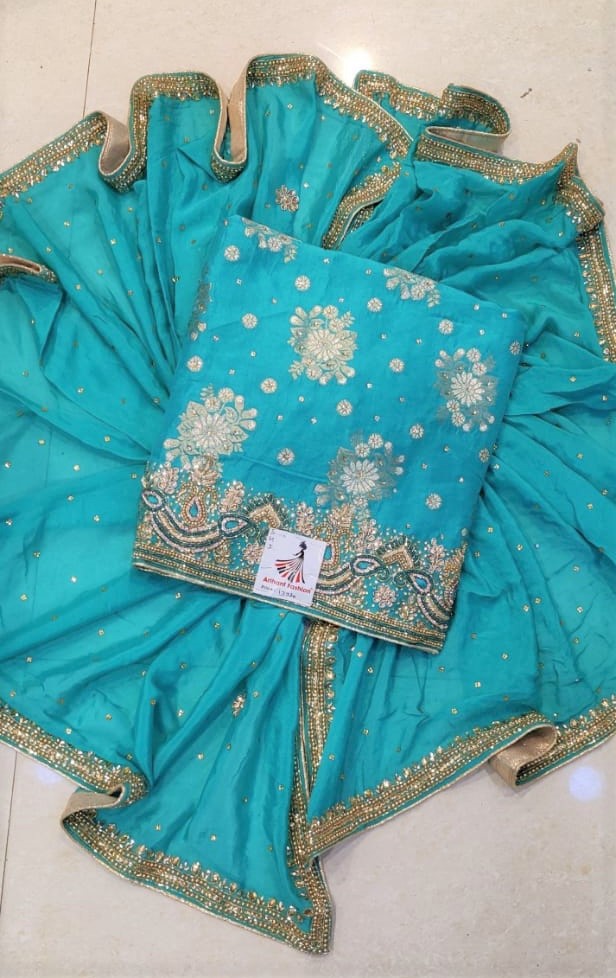 The Beautiful Sky Blue colour Opada silk suit with Chinon dupptta